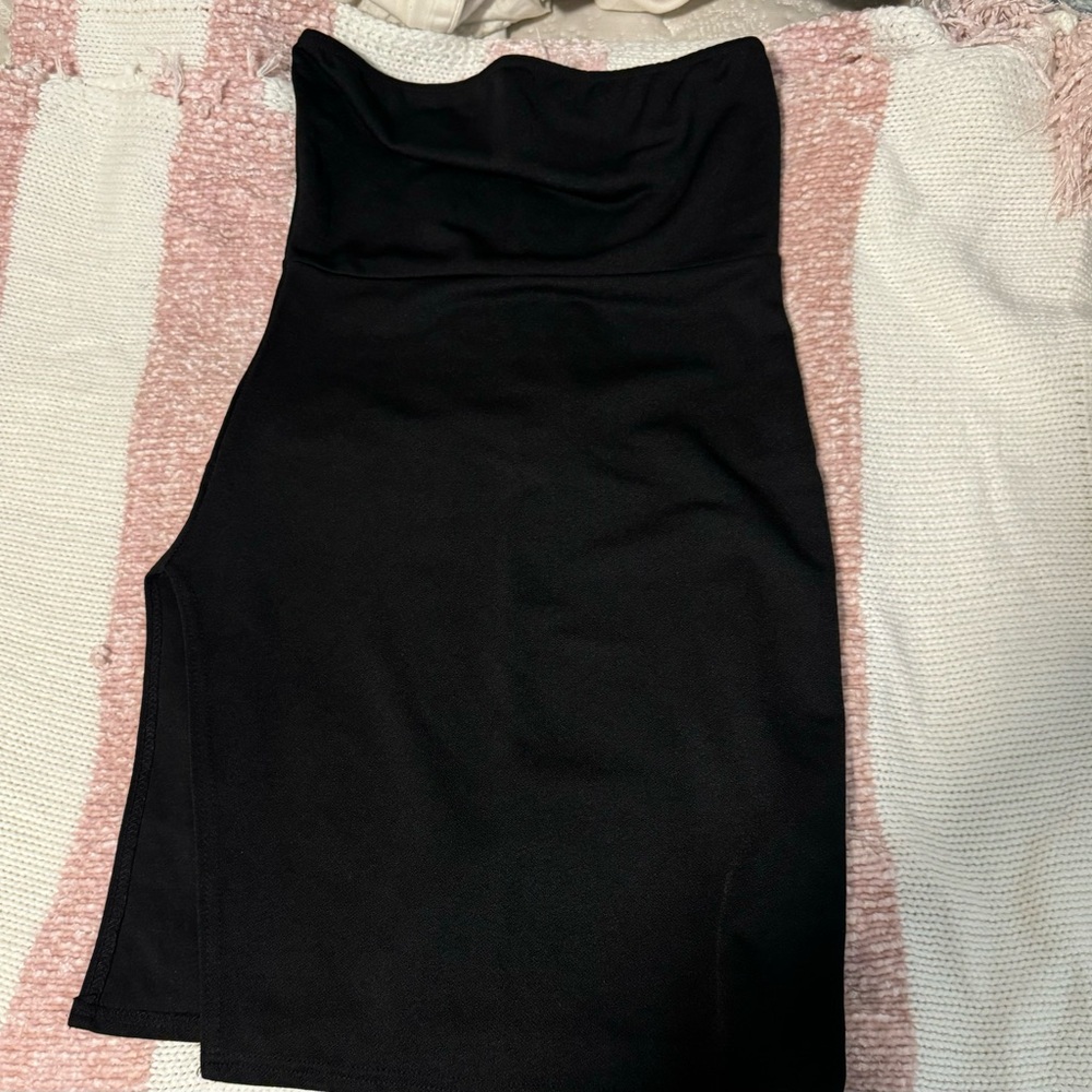 Black dress w/ little opening on the side.